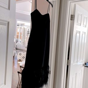 Size 8 new, never worn Monique Lhuillier  formal black midi, boa feather trim.